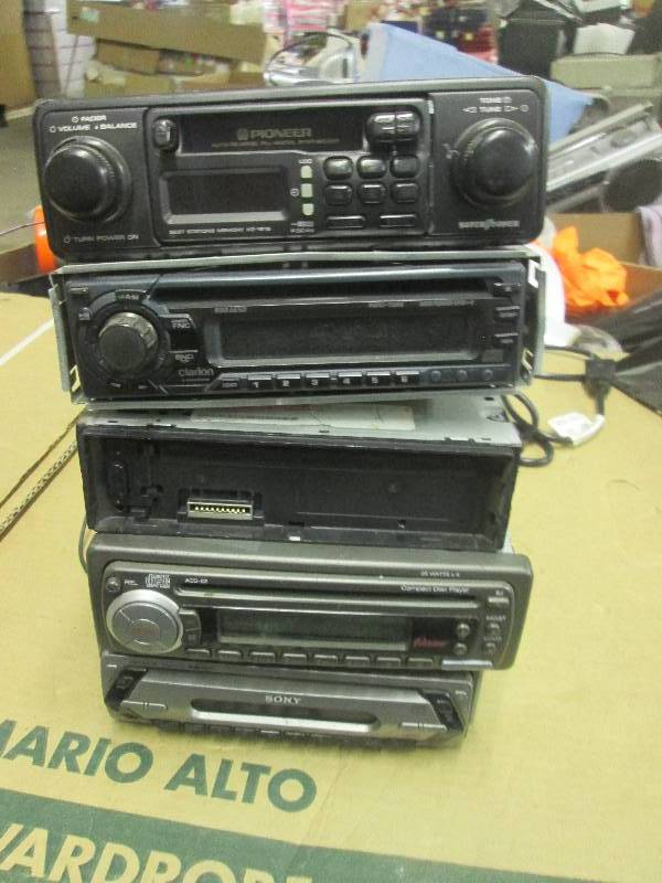4 car radios all  untested ...