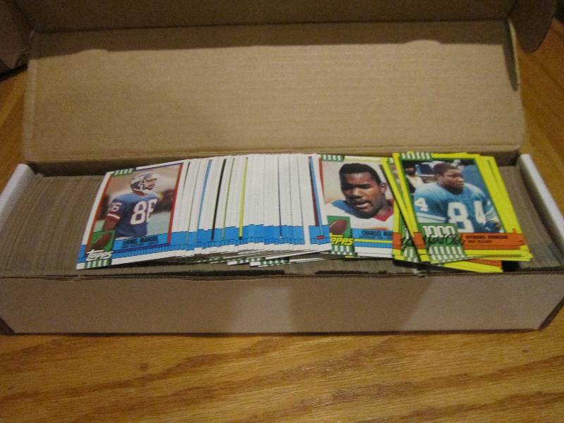 Box of 1990 Topps football cards...