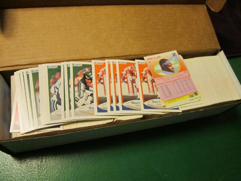 Box of 1990 Fleer football cards...