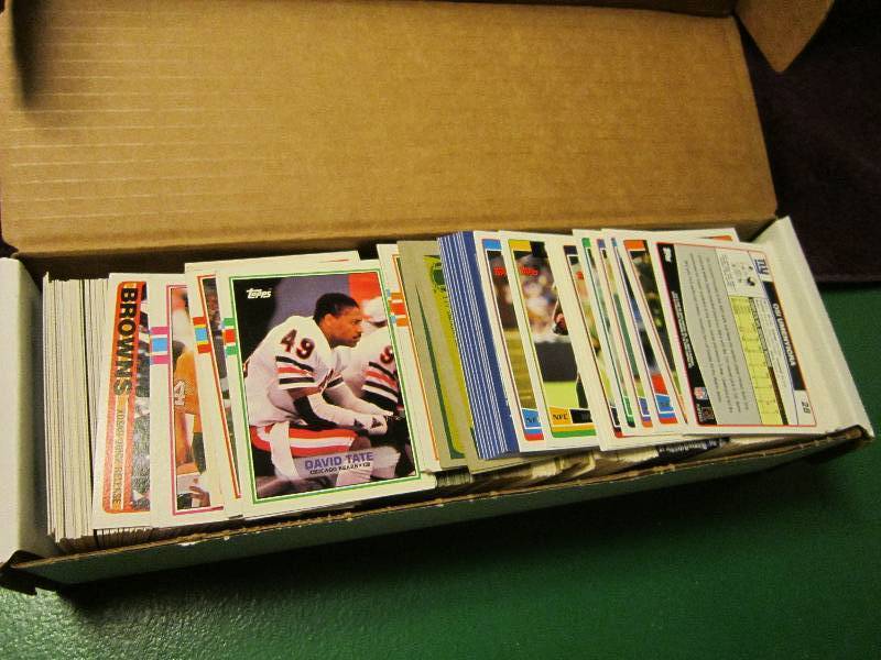 Box of Topps football cards...