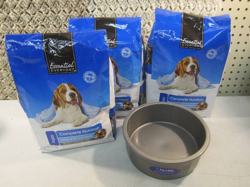 lot 85 image: Lot of 3 Bags Puppy Food and a Food...