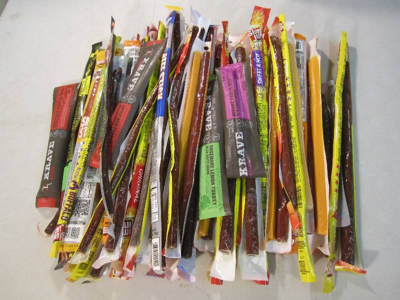 lot 89 image: Large Lot of Meat Sticks Various Br...