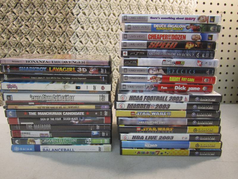 lot 180 image: Mixed Lot DVD and UMD Videos and Ga...