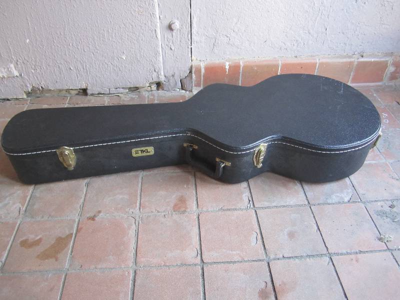 lot 189 image: TKL Hard Shell Acoustic Guitar Case...