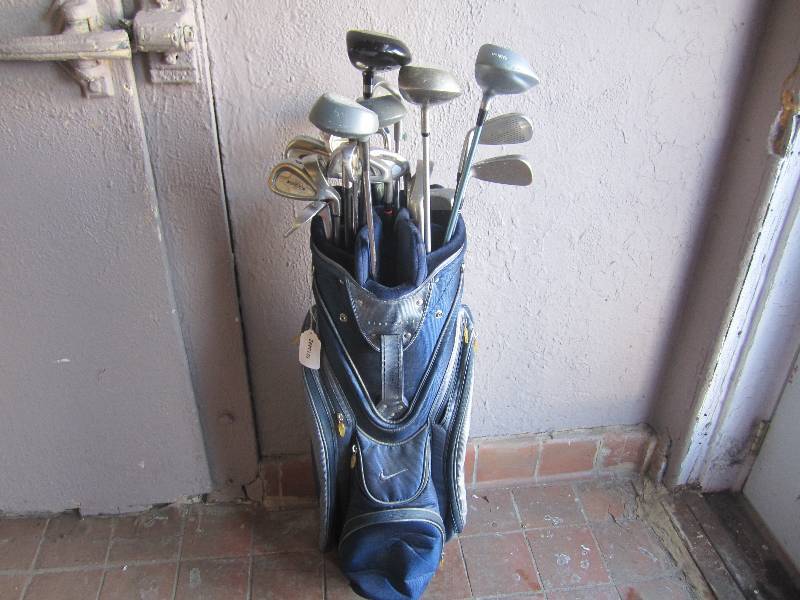 lot 210 image: Nike Golf Bag and 21 Misc Golf Club...