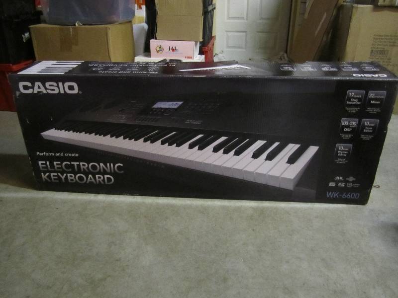lot 237 image: Large Casio Electronic Keyboard Per...