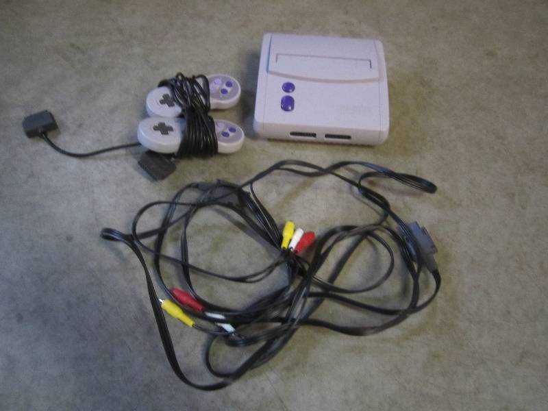 lot 244 image: Super Nintendo Game System with Con...
