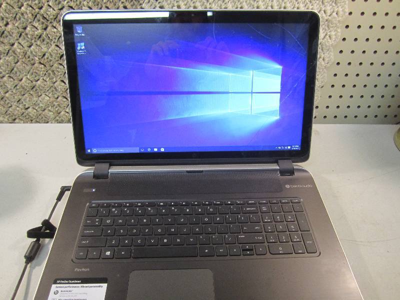 lot 262 image: HP Laptop Computer with Cord Has a ...