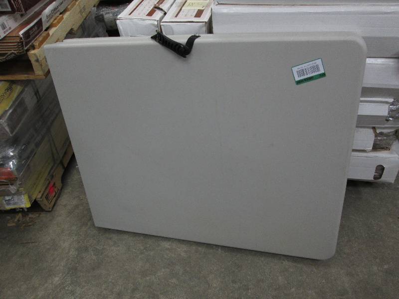 lot 36 image: HDX 6ft Earth Tan Folding Table...