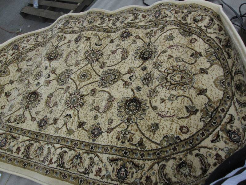 lot 84 image: Triumph Oval Rug 32 x48 inch ...
