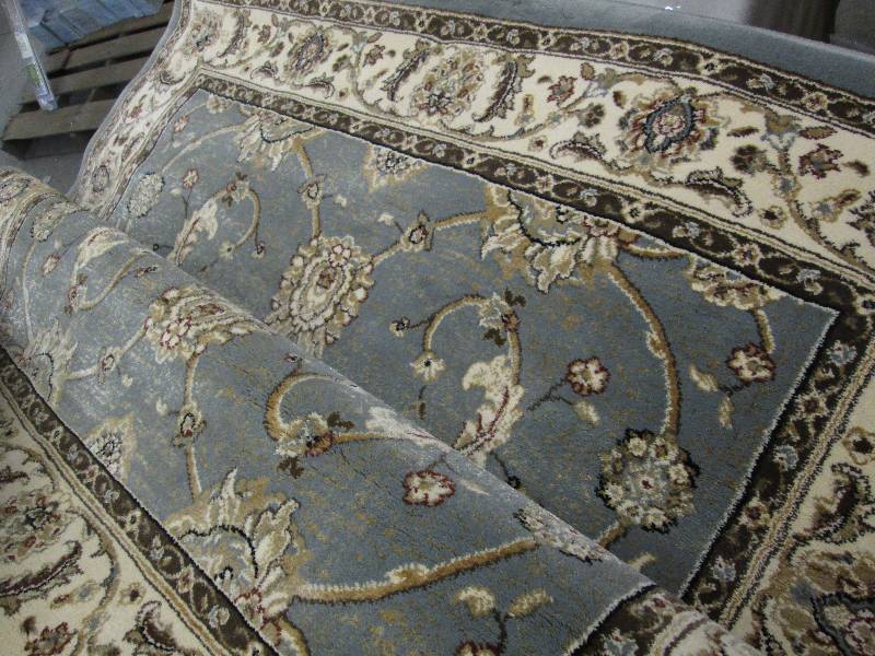 lot 88 image: 4 ft x 62 inch Triumph Area Rug...