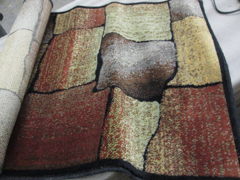lot 98 image: Mondrian 24x42 inch Area Rug...