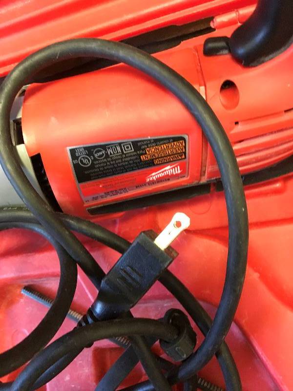 lot 10 image: Milwaukee 12 in. Pistol Grip Dual Torque Hammer Drill with Case used in good working condition