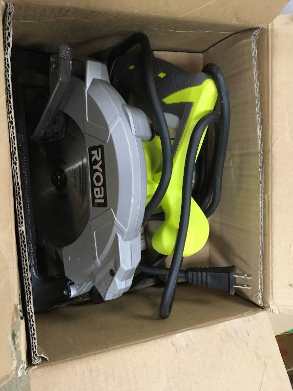 lot 16 image: Ryobi 7-14 in. Circular Saw with Laser used in good working condition