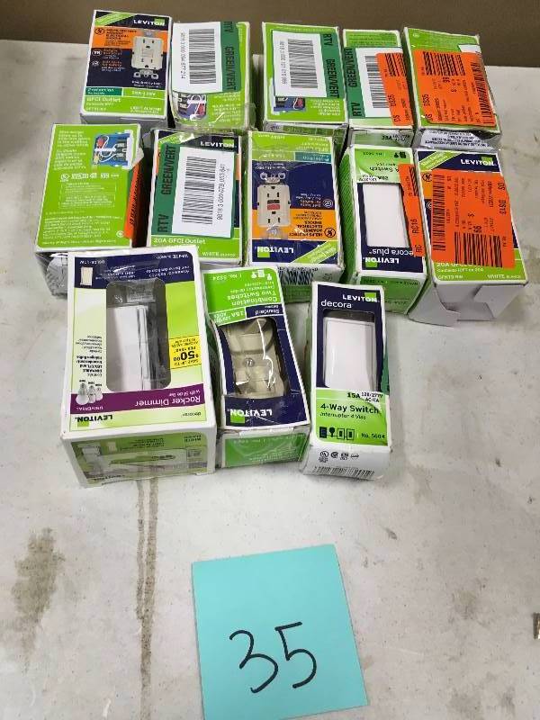 lot 35 image: Misc. Cobination 2 & 4 Switches & Outlets - Lot of 13