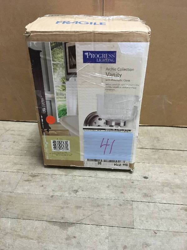 lot 41 image: Progress Lighting Archie Collection 1-Light Antique Nickel Bath Sconce with Clear Prismatic Glass Shade