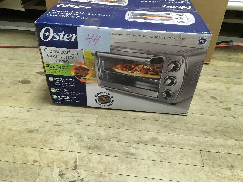 lot 44 image: Oster Convection Countertop Oven not used