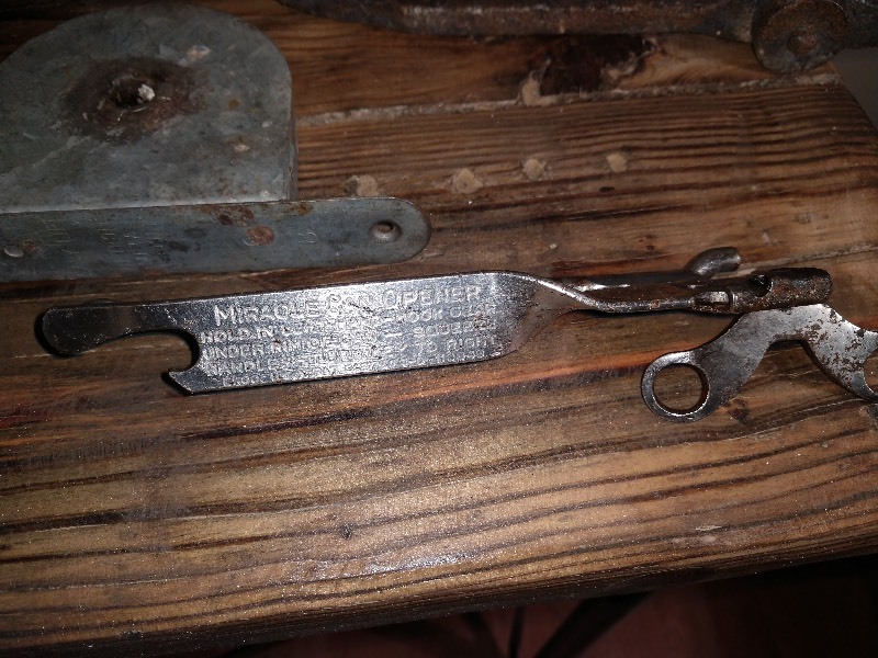 lot 4 image: Industrial Salvaged Items (Hand Forged Hay Hook, Spring, Work Light Lids, Sprocket, S. Wrench, Can Opener, Meat Grinder, Blue Toolbox...)