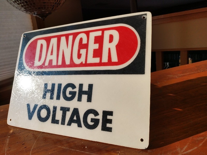 lot 28 image: Danger High Voltage Sign