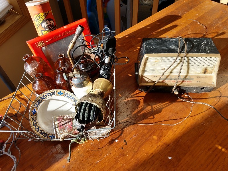 lot 32 image: Mannequin Viola Head, Pants Hanger, Wire Basket and Items in Wire Basket and AMFM Radio