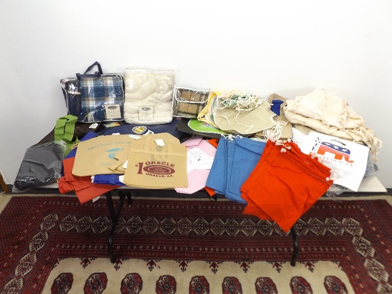 lot 34 image: Large Lot of NOS Salesman Sample Bags, Blankets, etc.