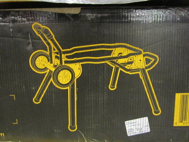 lot 11 image: DEWALT Rolling Table Saw Stand