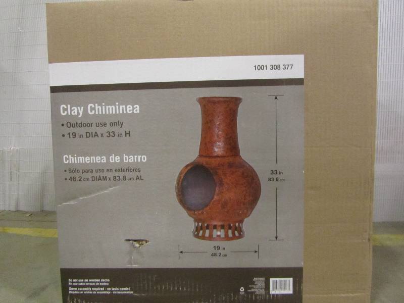 lot 49 image: 19 in. Clay Chiminea