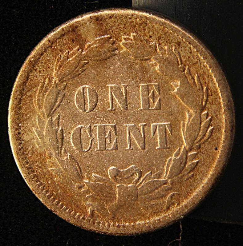 lot 17 image: 1859 INDIAN HEAD CENT AU (looks UNC in hand)