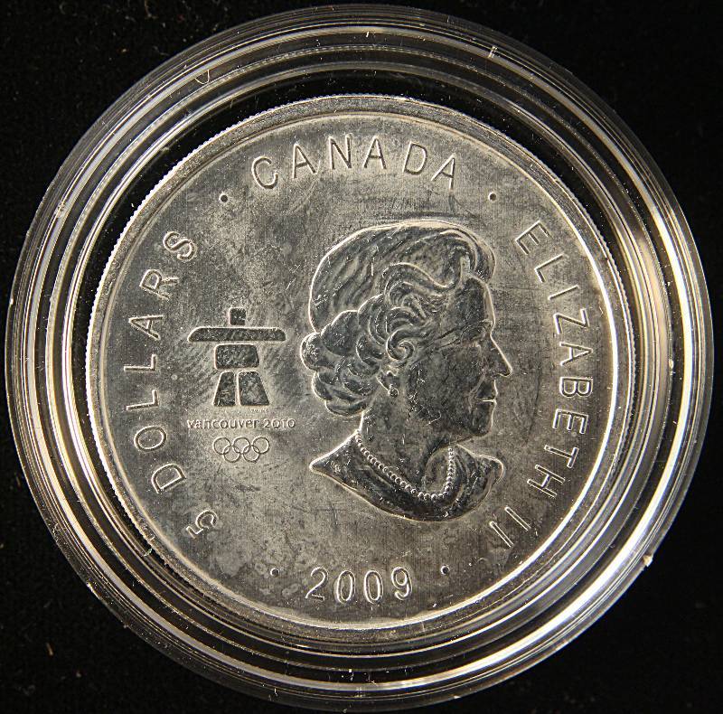 lot 18 image: 2009 CANADA THUNDERBIRD MAPLE LEAF VANCOUVER 1 OZ. .999 FINE SILVER IN AIRTITE