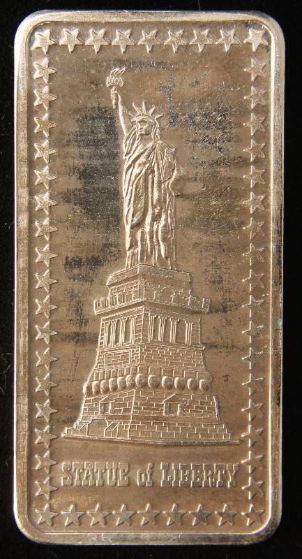 lot 104 image: 1 TROY OZ. .999 FINE SILVER BAR STATUE OF LIBERTY HAMILTON MINT