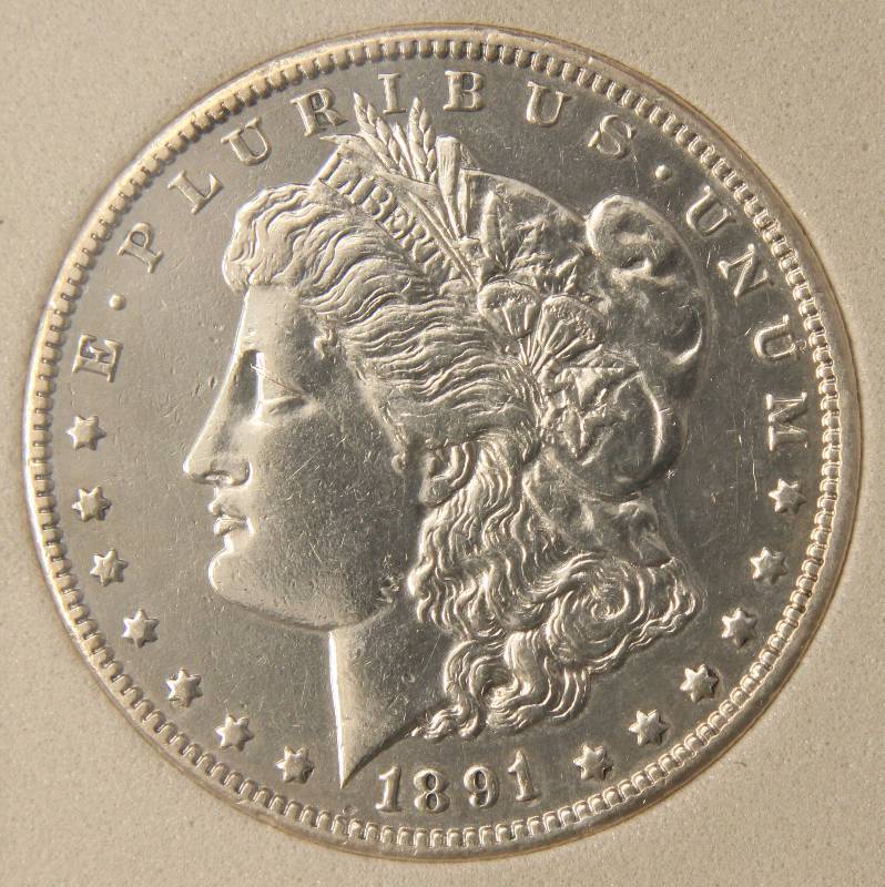 lot 07 image: 1891-CC CARSON CITY MORGAN SILVER DOLLAR MS63 NCGS