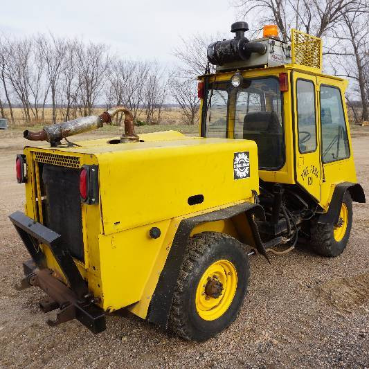 lot 8 image: Bombardier BM-50 4 x 4 Articulating Side Walk Snow Blower With Rear SaltSand Spreader