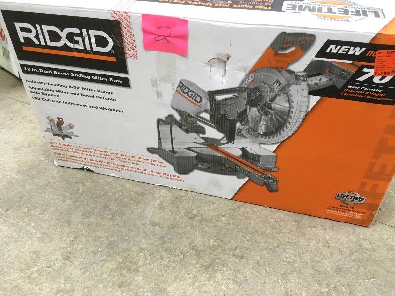 lot 2 image: Ridgid 12 in. Dual Bevel Sliding Miter Saw in like New  working conditions