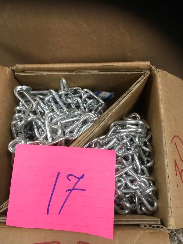 lot 17 image: Arnold Tractor Tire Chains for Wheels open box never used