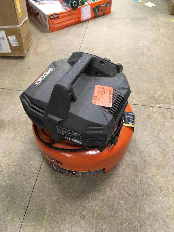 lot 21 image: Ridgid Pancake Air Compressor in working conditions
