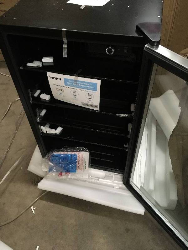 lot 11 image: Haier 20.5 in. 150-Can Beverage Center open box not used