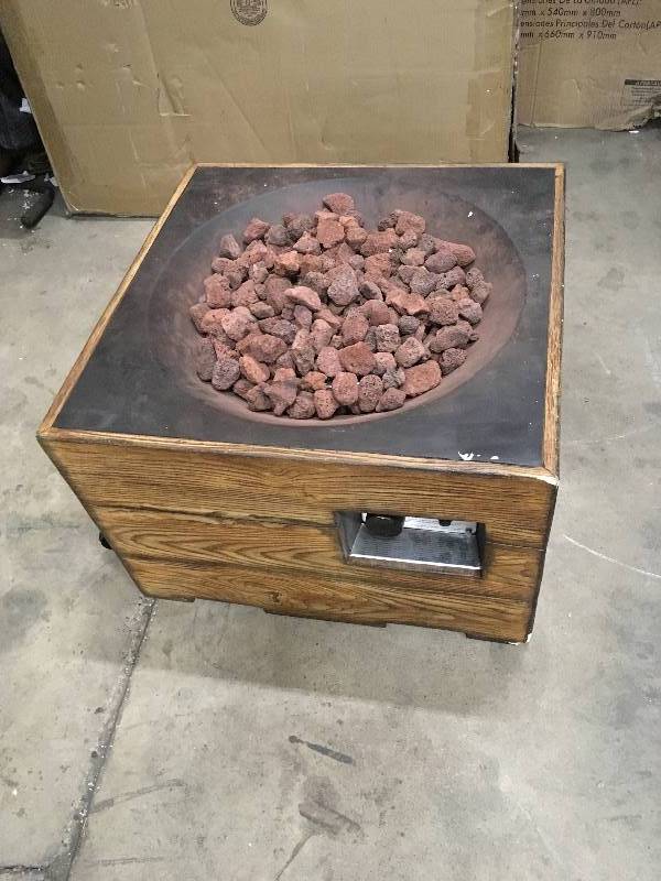 lot 20 image: Sunjoy Kent 23.6 in. Brown Fire Pit in good condition whit black cover