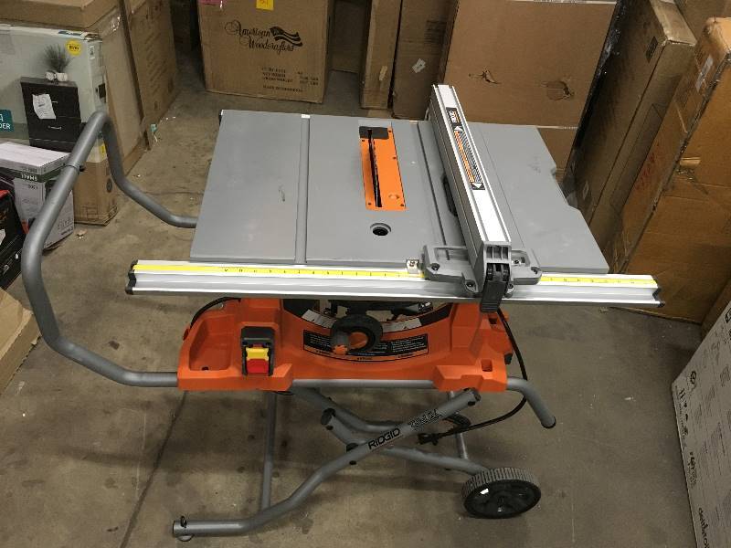 lot 48 image: Ridgid 15 Amp 10 in. Heavy-Duty Portable Table Saw with Stand In working conditions