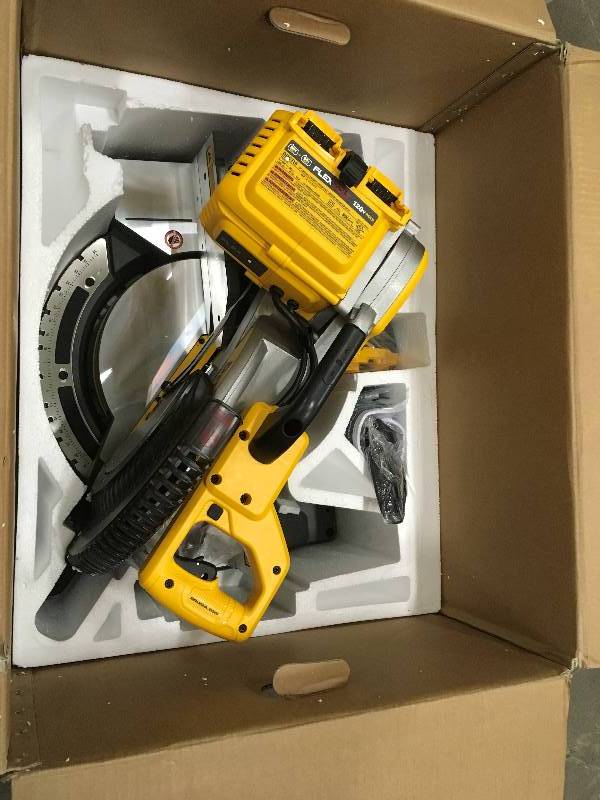 lot 52 image: DeWalt 120 Volt MAX FLEXVOLT Cordless Lithium-Ion 12 in. Fixed Compound Miter Saw with Adapter not used in working conditions