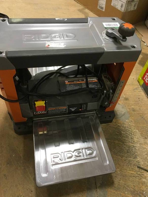 lot 72 image: RIDGID 13 in. Thickness Corded Planer in workinmg conditions