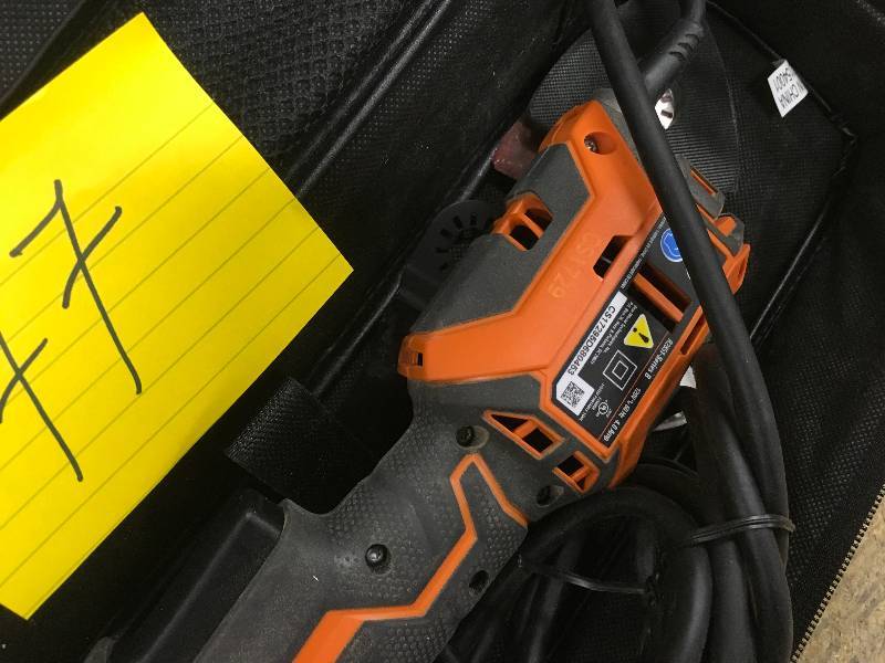 lot 77 image: RIDGID JobMax 4 Amp Multi-Tool with Tool-Free Head in working conditions