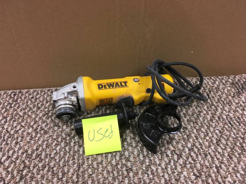 lot 22 image: DeWalt DWE402W 11 Amp 4-12 in. Angle Grinder with Paddle Switch & Wheel Used in good working condition