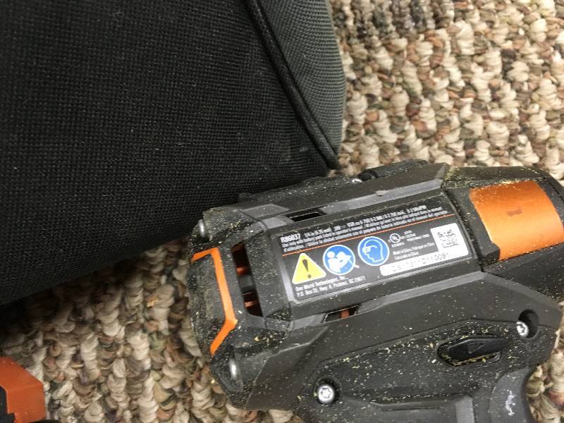 lot 68 image: Ridgid 7-14 18 Volt Saw with 18 Volt Impact Driver Kit