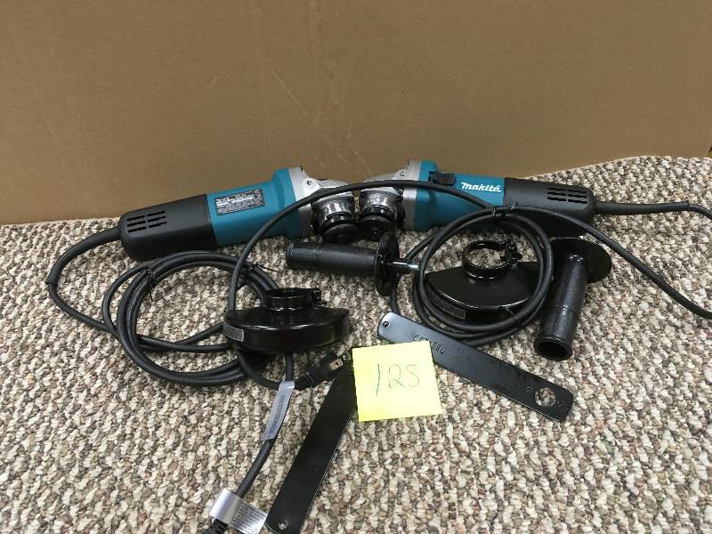 lot 128 image: Makita 9557NB2 7.5 Amp 4-12 in. Slide Switch ACDC Angle Grinder 2-Pack