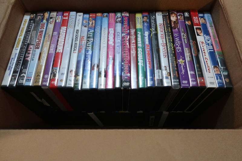 lot 38 image: BOX OF 54 DVDS
