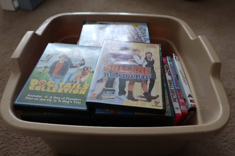 lot 54 image: TOTE OF DVDS