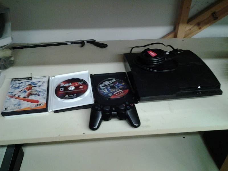 lot 7 image: Sony PS3 With Power & AV Cords, 1-Wireless Controller, 3-Games