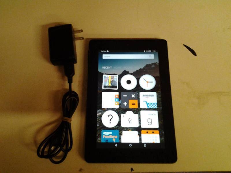 lot 9 image: Amazon Fire Tablet With Charger