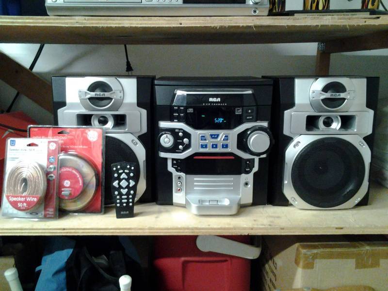 lot 15 image: RCA 5-Disc CD Changer With Remote, NEW CD Cleaning System & NEW 50 Speaker Wire