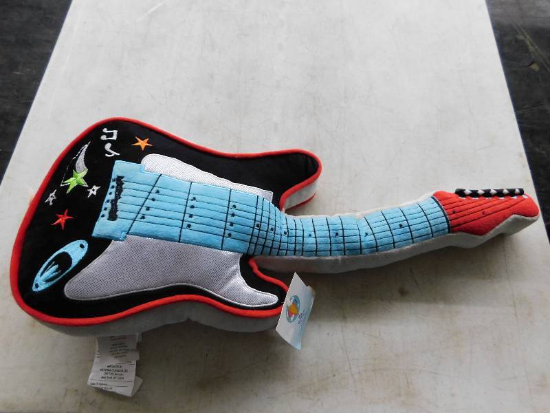 lot 445 image: STUFFED GUITAR TOY